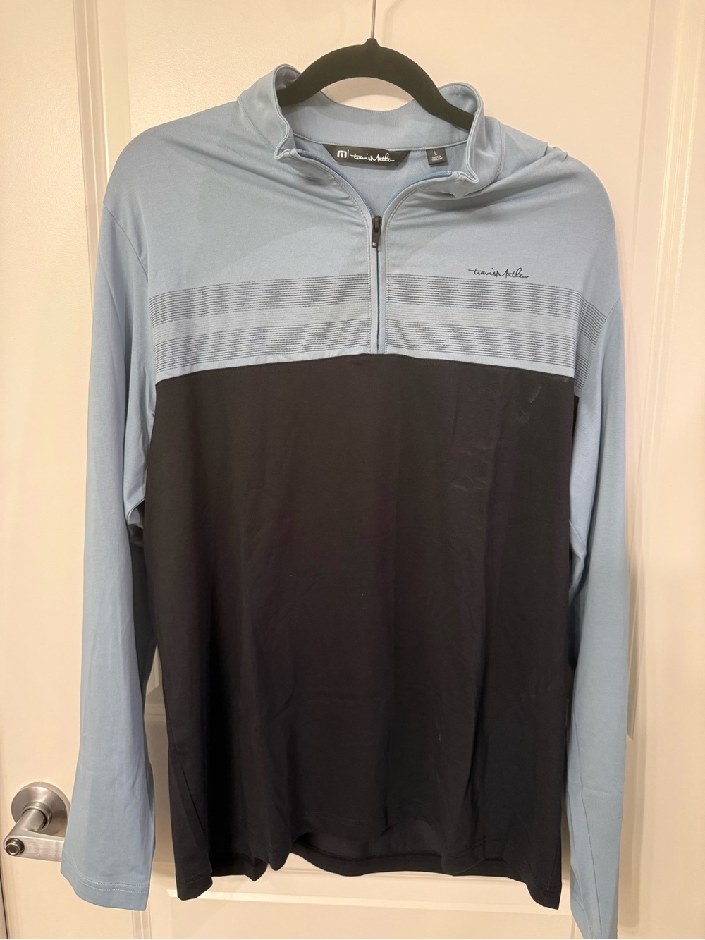 Travis Mathew Light Blue and Black Colorblock Quarter-Zip Pullover